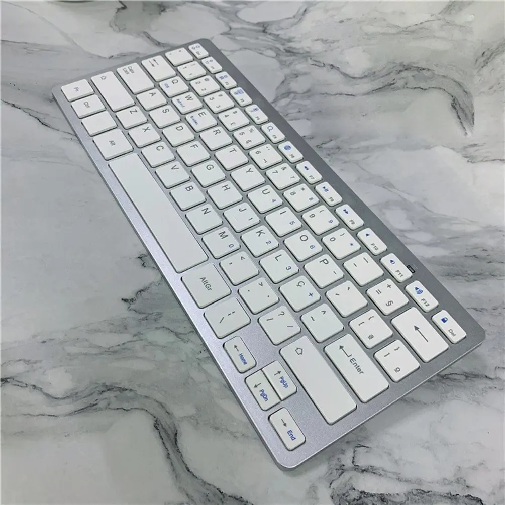 

Bluetooth 3.0 Wireless Keyboard 78-Key Keyboard Portuguese for Ios Tablet Ultra-Thin Portable Keyboard for IPad PC Windows