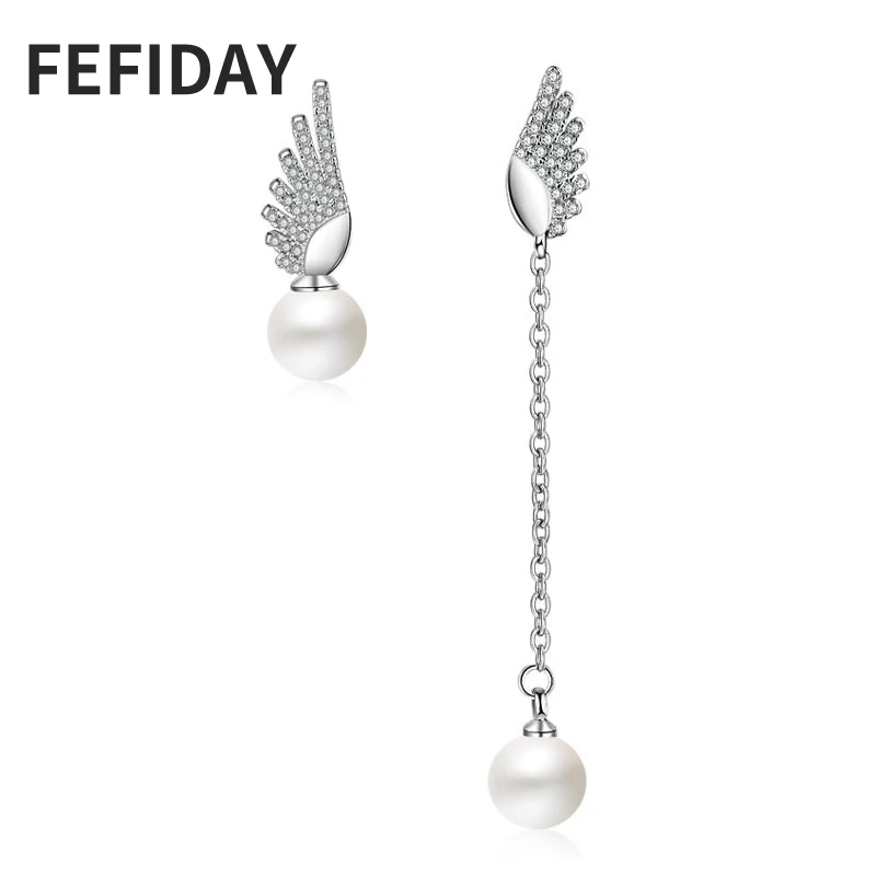 Женские асимметричные серьги ангельские крылья висячие с кристаллами длинная