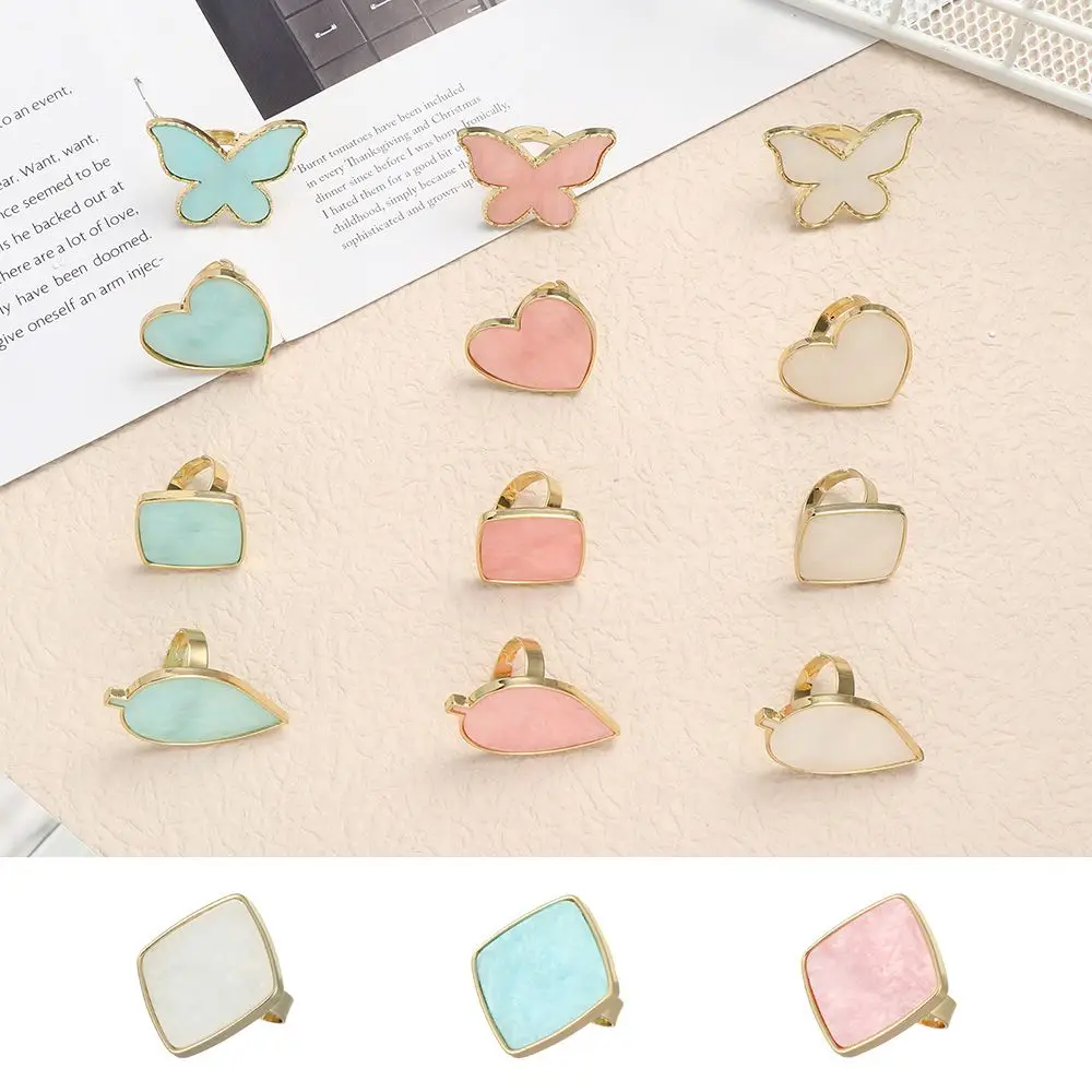 

Resin Stone Heart Shape Nail Art Palette Golden Rim Agate Nail Display Finger Ring Painting Palette Pigment Holder Showing Shelf