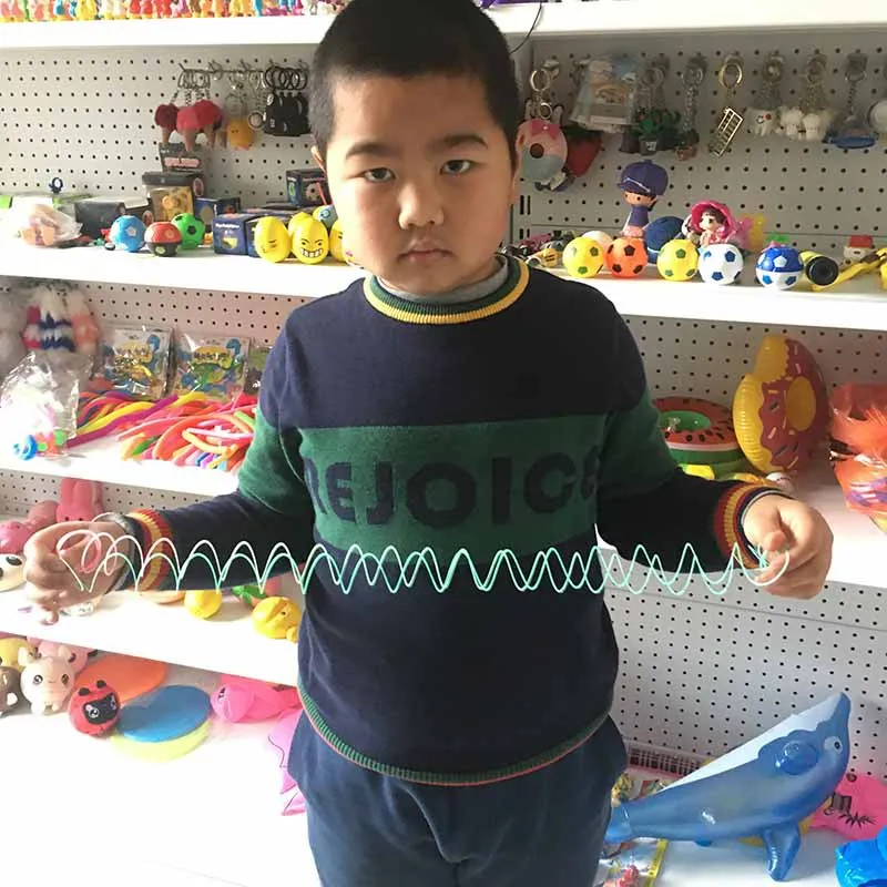 

10Pcs/Lot Rainbow Circle Funny Toys Early Development Educational Folding Plastic Spring Children's Coil Kids