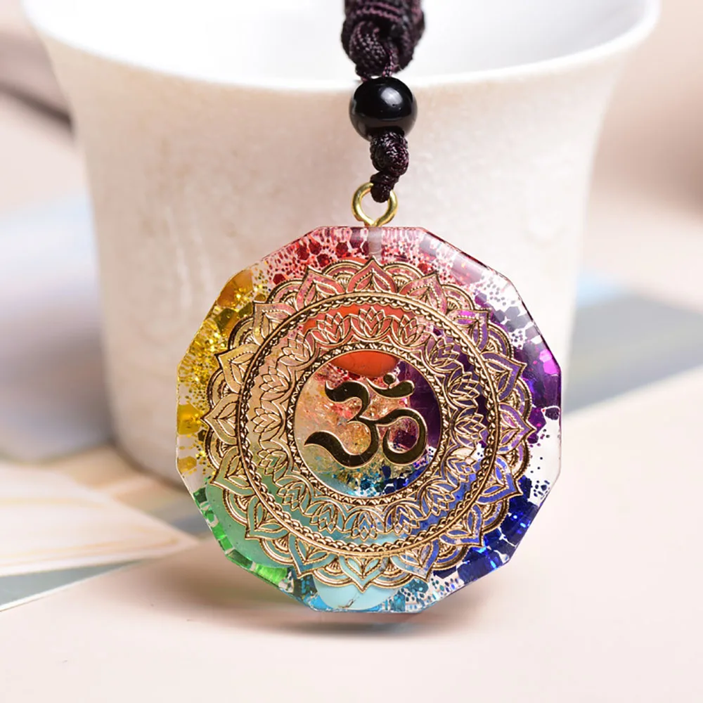 

Natural 7 Chakra Orgonite Energy Om Symbol Crystal Pendant for Reiki Healing Stone Handmade Relaxation Meditation Yoga Jewelry