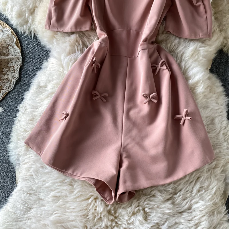 

Amolapha Women Summer Short Puff Sleeve Sweet Style Romper Playsuit Solid Square Collar Slim Waist Bow Young Girl Mini Jumpsuits