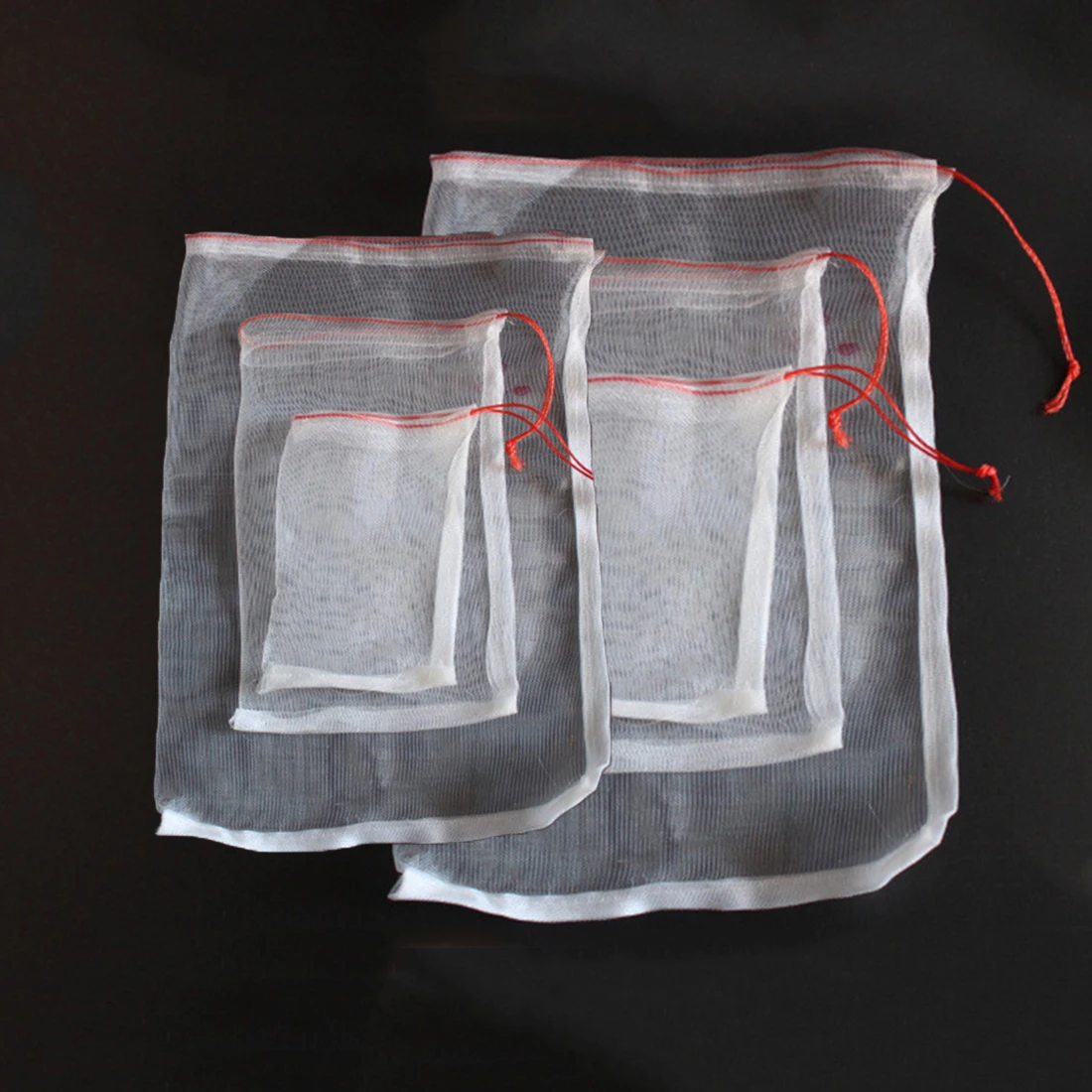 

100pcs Garden Plant Fruit Protect Drawstring Net Bag Against Insect Pest Bird For Fruits To Protect Your Harvest