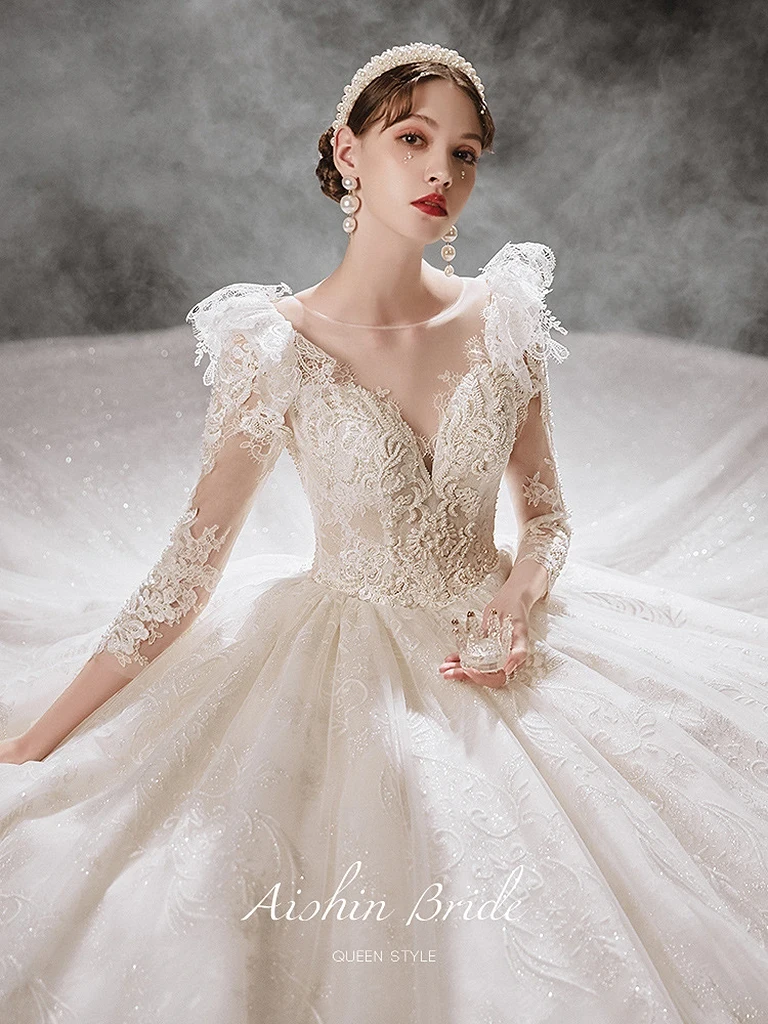 

Princess Wedding Dresses 3/4 Sleeves Shiny Luxury Pearls Lace Beaded Floral Trailing Illusion Neck Backless Bridal Gown New