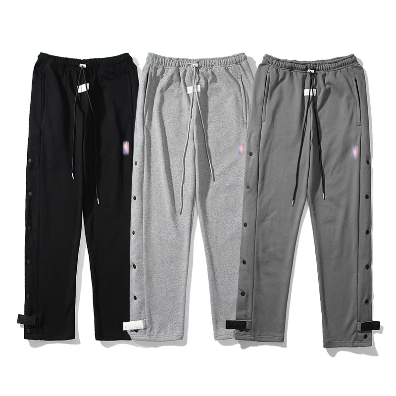 Брюки спортивные на завязках с боковыми пуговицами от Kanye West NB @ X NK Co фирменные