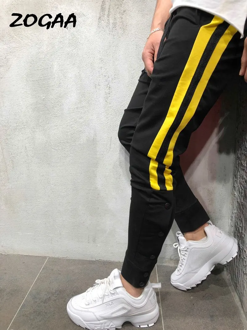 

ZOGAA 2020 new men's sports trousers tether color matching foot button buckle Harlan feet casual sport pants men