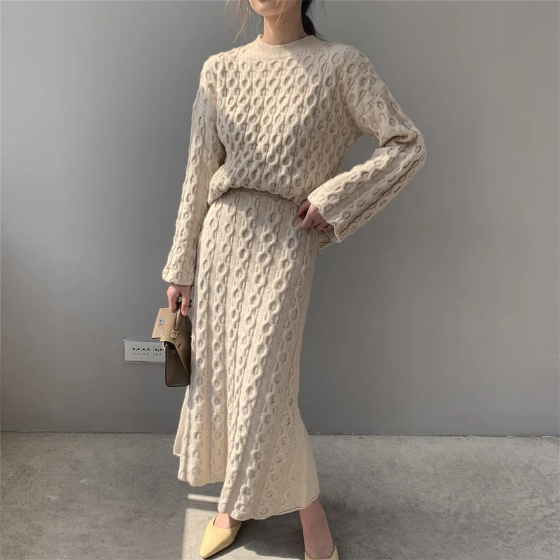 

Autumn and winter women's suit casual solid color round neck long-sleeved sweater + knitted skirt suit
