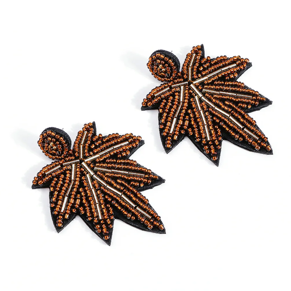 

The new wave of individual character vogue misia maple leaf pendant earrings female accessories wholesale