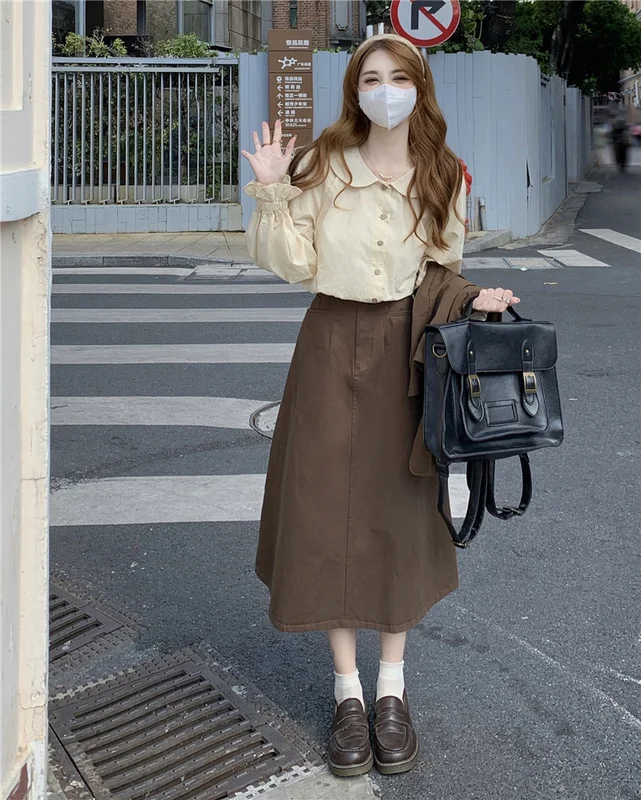 

Рубашка с длинным рукавом и кукольным воротником