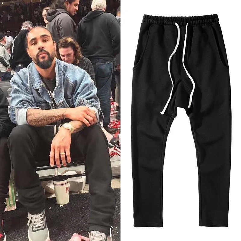 Мужские спортивные штаны свободные шаровары с эластичной резинкой на талии