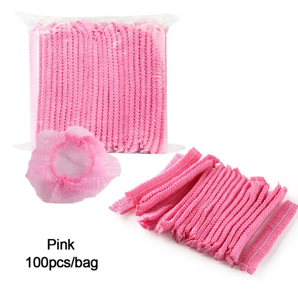 Pink non-woven 100 шт одноразовая шапочка для душа, Нетканая Пылезащитная Стерильная шапочка для татуажа, парикмахерские принадлежности для купания, чистящие средства для волос - Цвет: Pink non-woven
