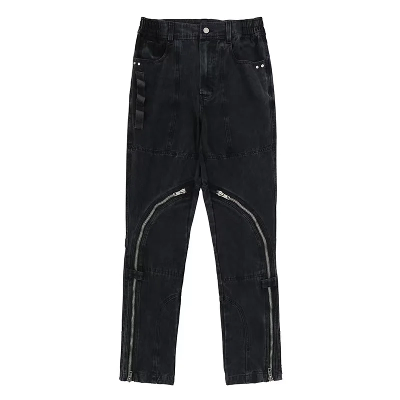 

Washed, distressed jeans, functional pants with multiple zippers