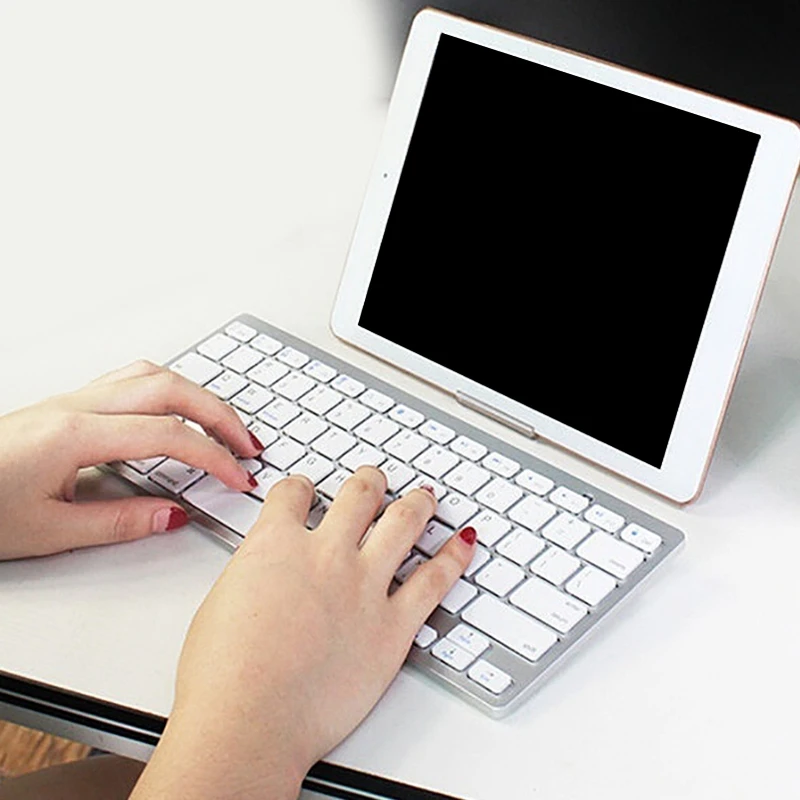 Ультратонкая портативная Bluetooth беспроводная клавиатура белого цвета Bk3001 для