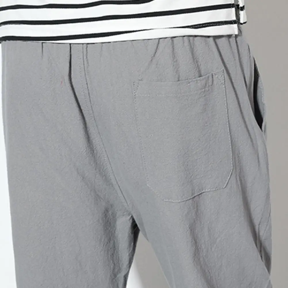 

Men Track Pants Solid Color Men Pants All Match Elastic Waist Pockets Drawstring Oversize Pants Trousers