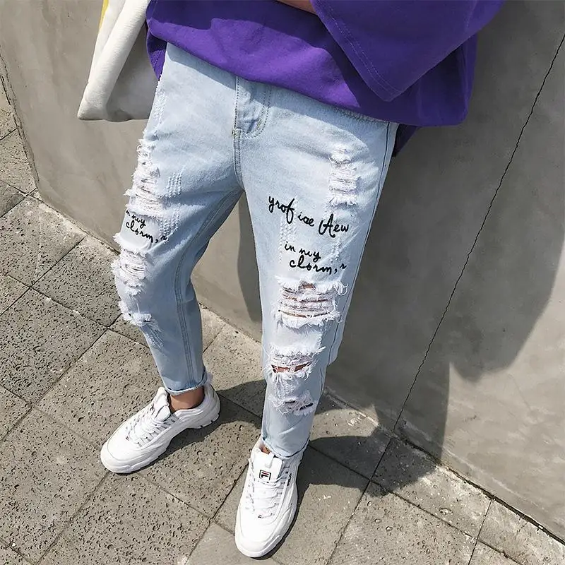 Super-hot oversized ripped jeans men's broken copper loose-fitting beggar South Korea scraped ninth pants pencil jeans for men