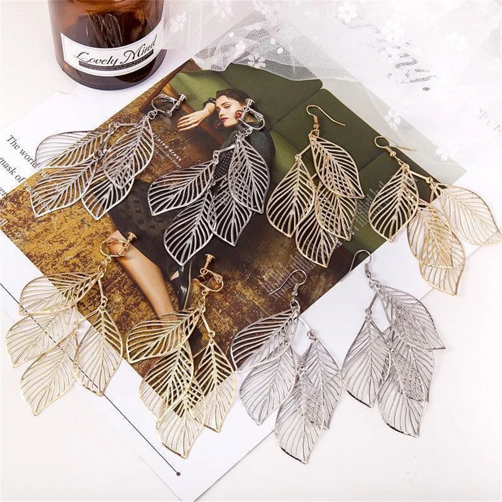 

Korean version of the new temperament hollow leaves leaves cold wind earrings female fresh and simple ear hooks