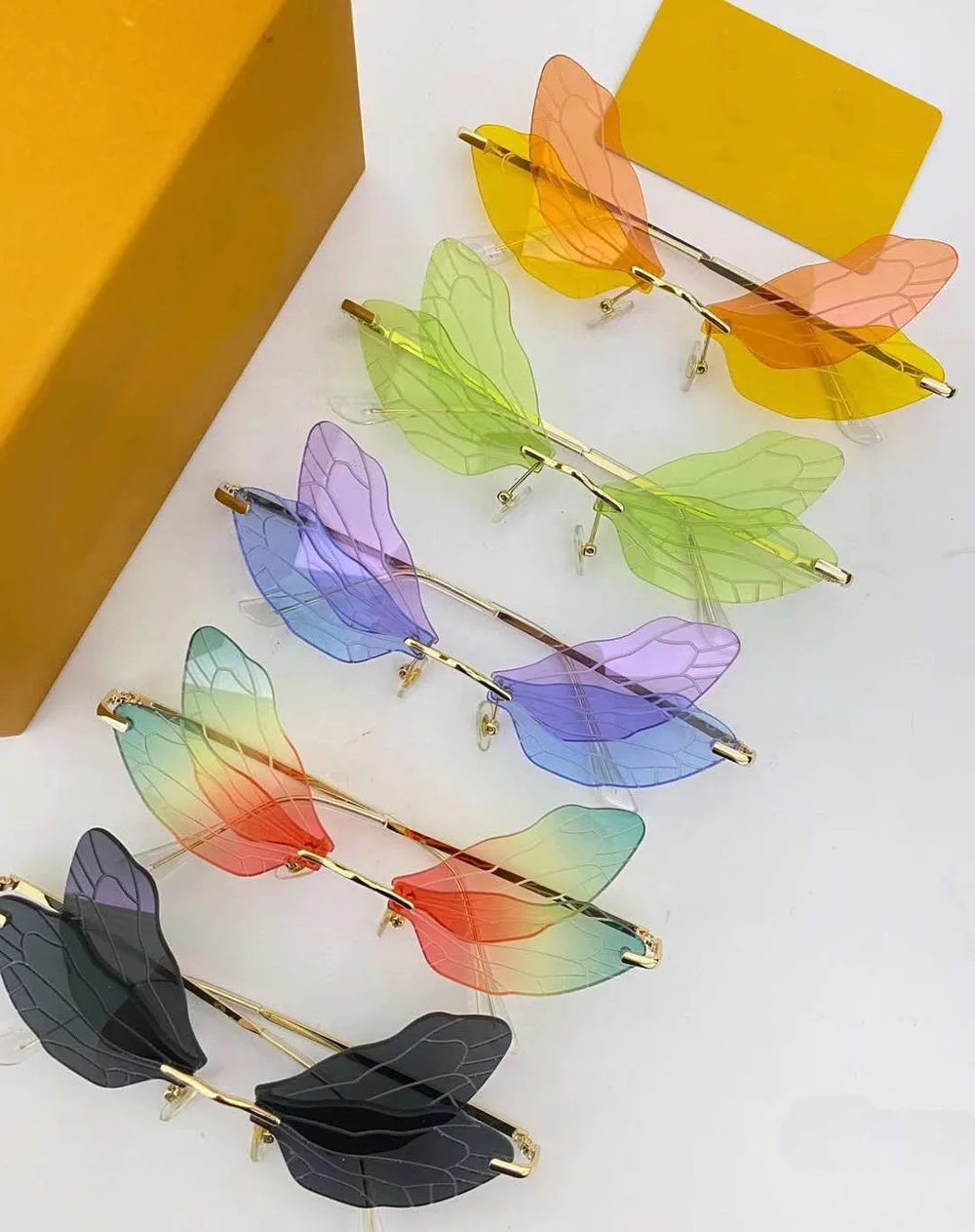 

Glasses With Butterfly Wings Rimless Dragonfly Wing Sunglasses Women Eyewear Lady Personality Sunglass Shades Gafas