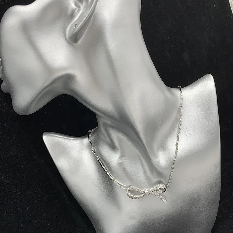 

New micro-inlaid zircon chain full of diamond three-dimensional bow necklace clavicle chain net red fairy butterfly pendant