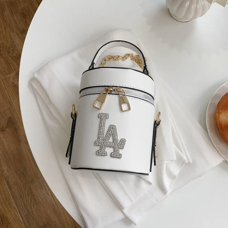 

womens hands cylinder female 2021 spring fragrance fashion portable cylindrical bucket solid color mini slant span bag purses