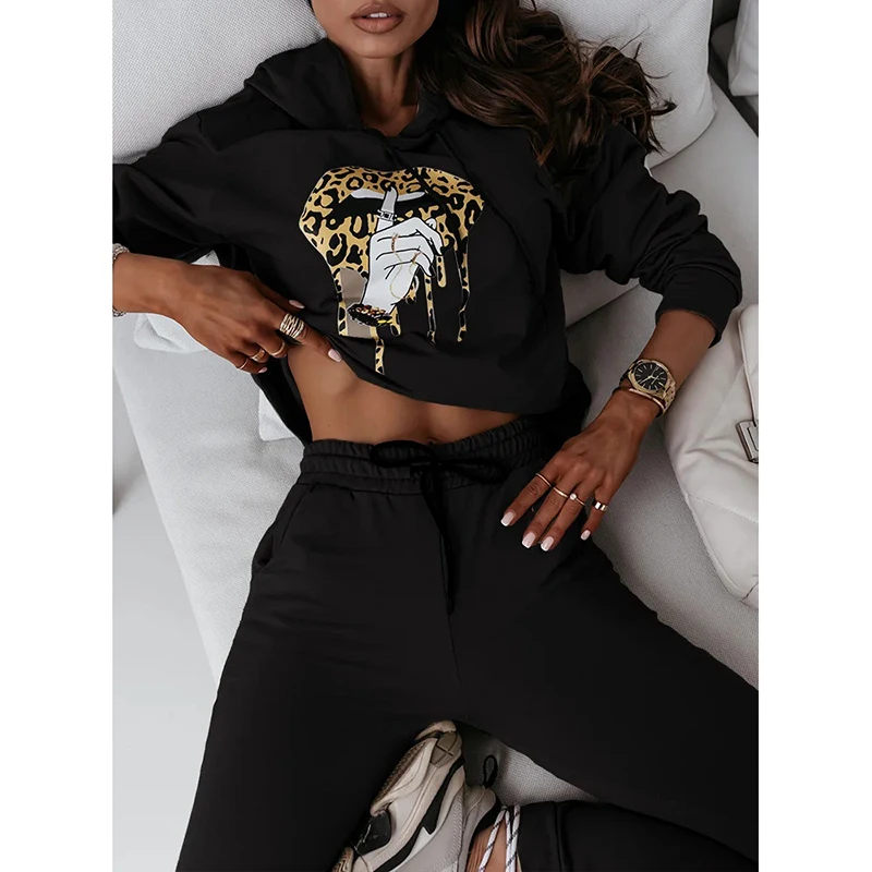 Женский костюм с топом капюшоном и брюками на шнуровке повседневный облегающий