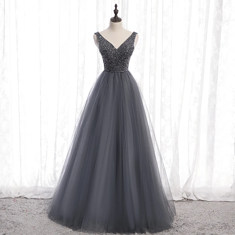 

Grey Tulle V Neck Sleeveless Prom Dresses A Line Floor Length Beaded Prom Gown Lace Up Formal Graduation Dress Vestido Formatura