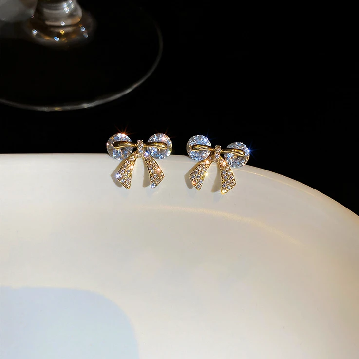 

Cute Female Crystal Bowknot Stud Earrings Charm Gold Color Wedding Earrings For Women Dainty White Zircon Small Earrings