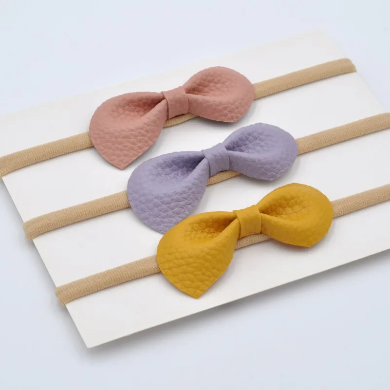 100Pcs/Lot  Faux Leather Bow Baby Headband Soft Nylon Hairband Newborn  Hair Accessory