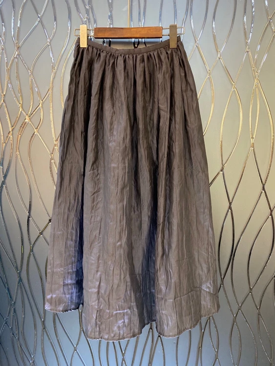 

Spring and summer 2021 new women's elastic waist solid color decoration fashion versatile mid length skirt 315