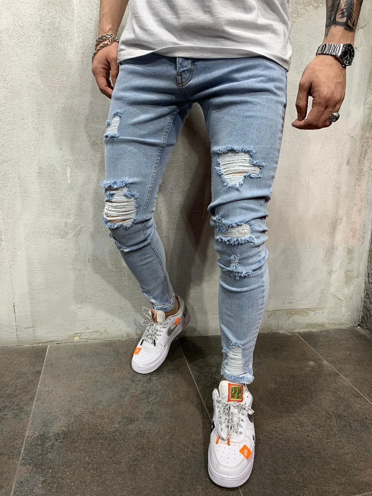 

Man Bound Feet Scraping Jeans Fashion Youth Holes Elasticity Slim Denim Pants