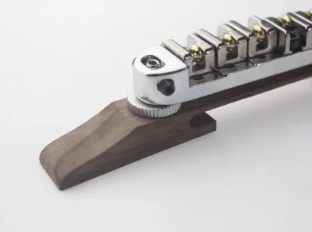 

High-end guitars pillow with spiral can be adjusted up and down the bridge string rosewood chrome color