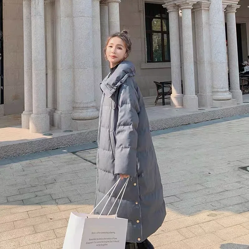 Женское зимнее пальто на белом утином пуху с капюшоном толстое средней длины