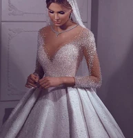 custom made luxury arabic dubai wedding dress 2021 illusion neck pearls beading long sleeve bridal gowns robe de mariee