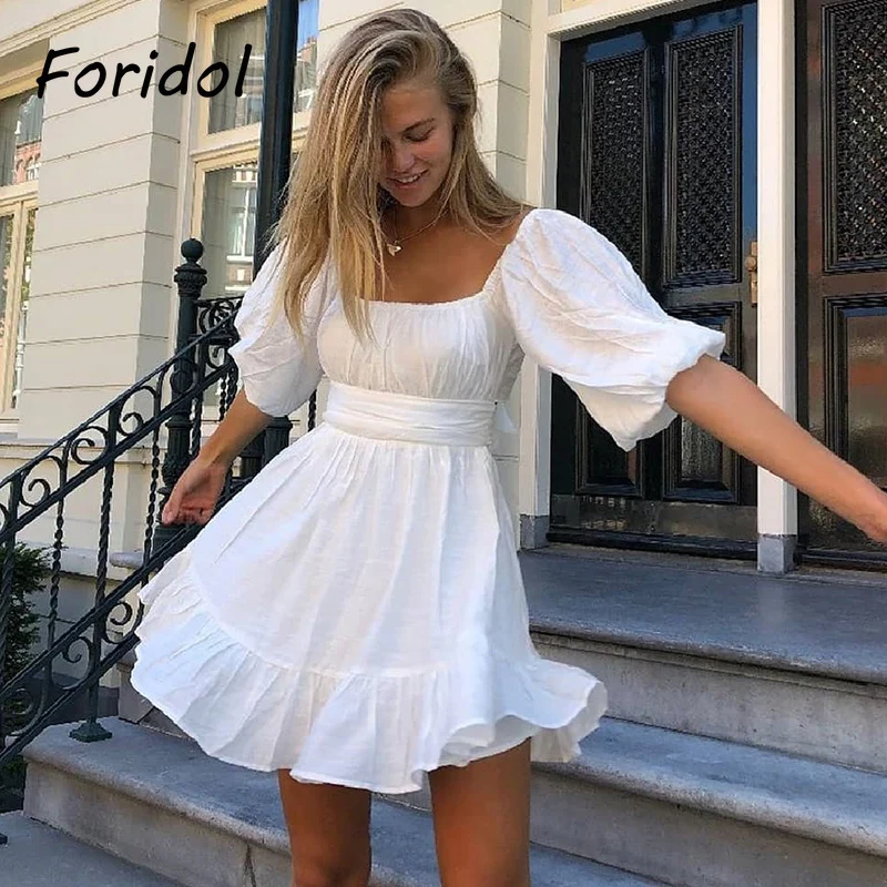 

Foridol White Vinatge Summer Dress Women Sexy Backless Puff Sleeve Beach Holiday Dress Casual A-line Backless Bowknot Dress 2021