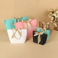 large size gift bag with handle and bow knot kraft paper box for cloth packages gift wrapping