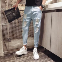 wholesale beggar ripped hole denim jeans mens loose korean style trendy brand small feet casual pants autumn thin mens pants
