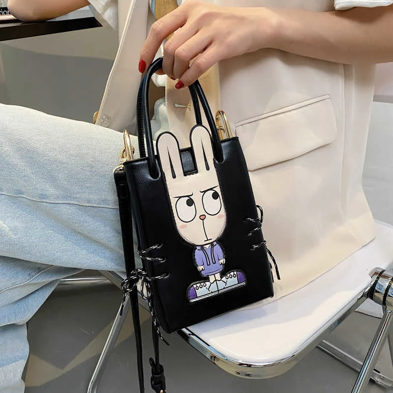 

Ins cute cartoon hand-held bag pu2021 new fashion women's summer one shoulder mobile phone bag for Japan and South Korea