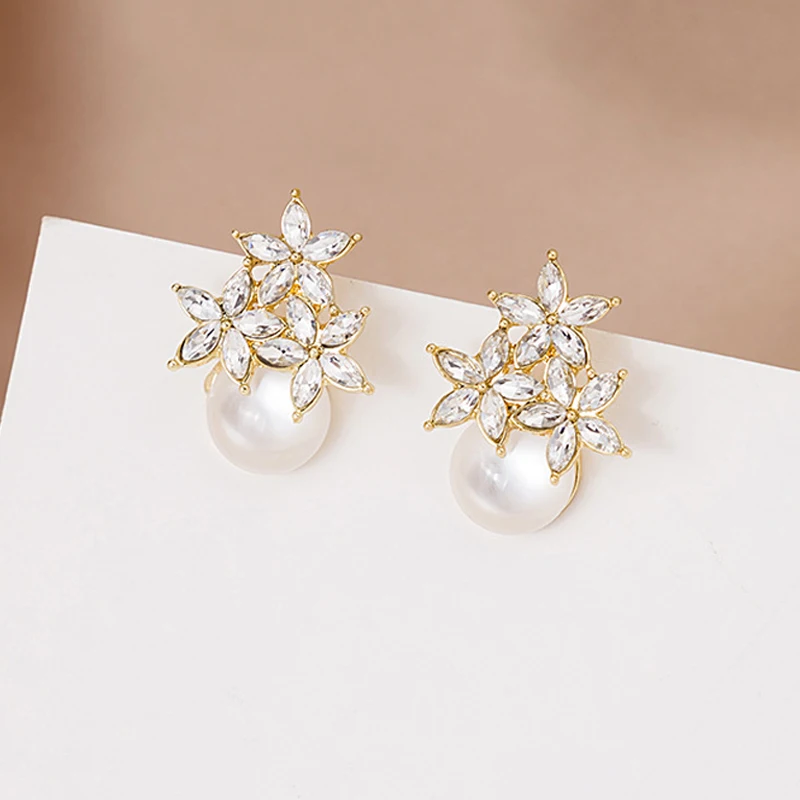 

Cystal Flower Earrings for Women Cat Eye Stone Stud Earrings Prevent Allergy Needle Stud Earring Kpop Earring Jewelry