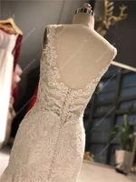 2021 Newest High Quality Customized Ivory Lace Deep V-neck Sleeveless Open Back Mermaid Floor Length with Train Wedding Dress