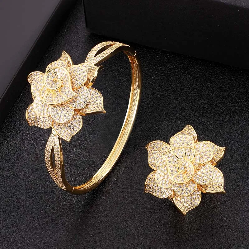 

Набор свадебных украшений Zlxgirl, классический браслет и кольцо с цветком из циркония класса ААА, комплект из 2 предметов, золотистый браслет, ...