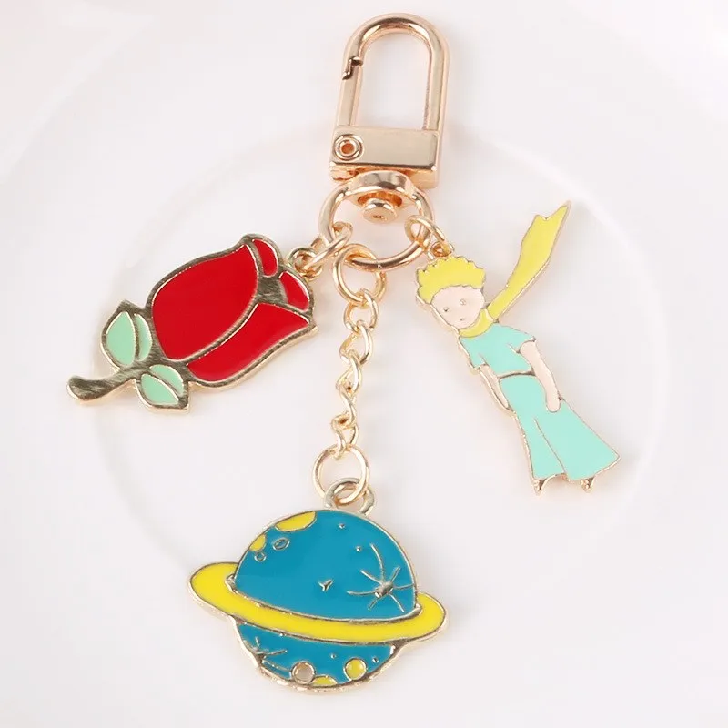 

Korean Rose Boy Pendant Key Ring Alloy Little Prince Star Universe Key Chain Creative Student Bag Key Chains Wholesale