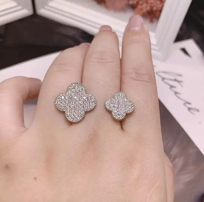 

Four-leaf flower plant lovery ring women simple wind new Clouds classic opening index finger ring flower
