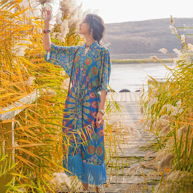 

In the new national wind in spring and summer Sue hem elegant long cardigan broken beautiful beach with blue dress