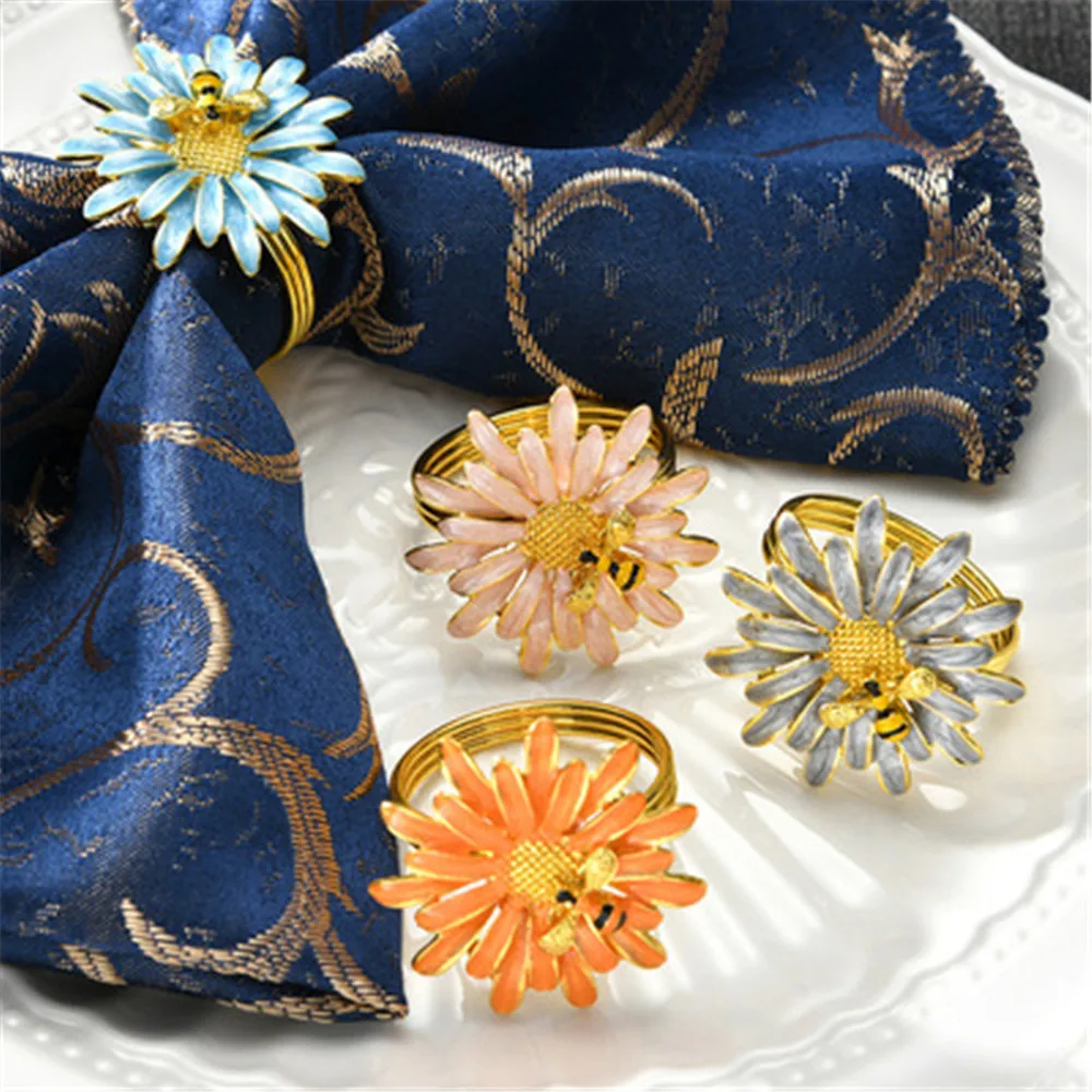 

12pcs hotel tableware bee flower napkin buckle Napkin Ring Chinese alloy Daisy napkin ring direct selling spot freight free