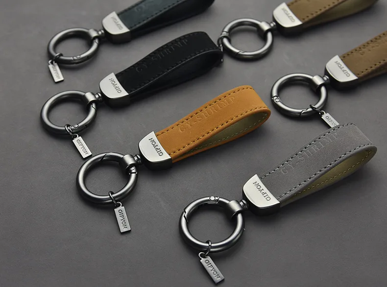 

006 car keychain high-end creative leather personalized waist pendant men's net red female luxury brand car pendant