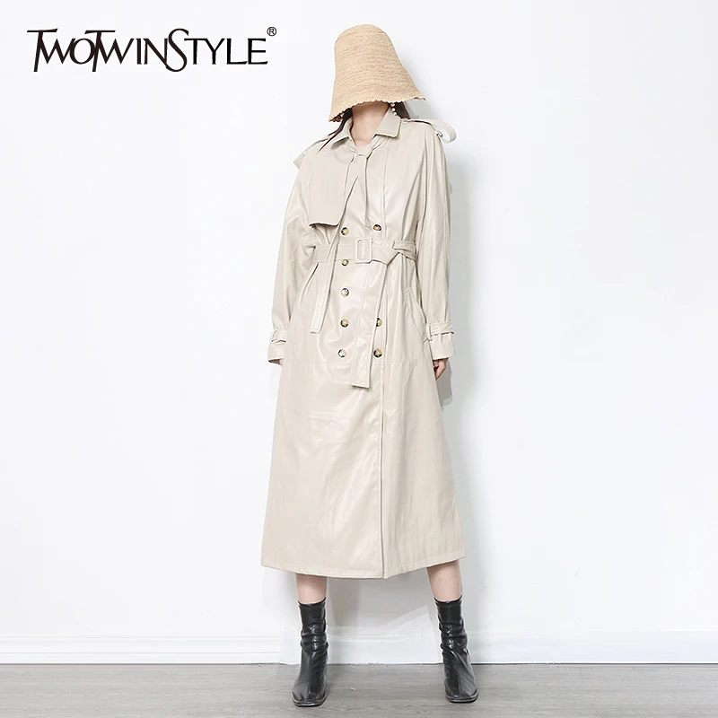 

TWOTWINSTYLE PU Leather Temperament Long Trench For Women Lapel Sashes Black Casual Windbreaker Female Fashion New Clothing 2021
