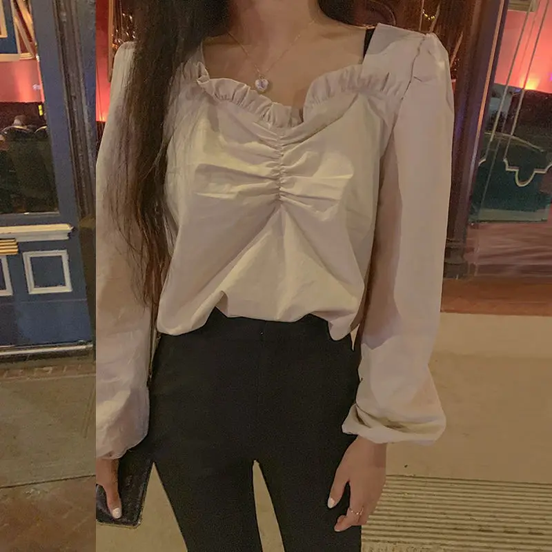 

Niche design sense retro shirt women's autumn 2021 new French Hong Kong style short cropped top