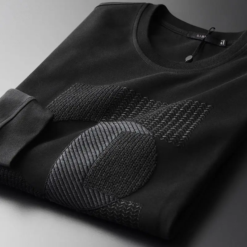 

2021 spring and autumn geometric embroidery pattern Fashion round neck sweater men's middle-aged and young men's black warm