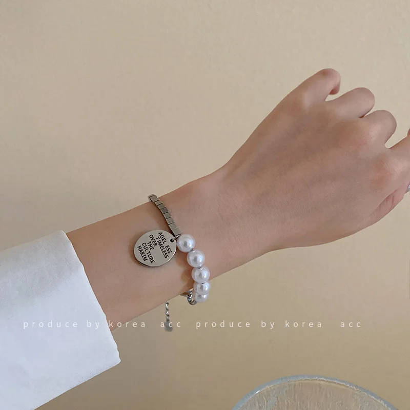 

Korea titanium round brand pendant pearl bracelet irregular spell to take over the ring fashion personality hand accessories