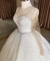 luxury arabic dubai wedding dress 2021 illusion o neck beaded heavily long sleeve bridal party gown robe de mariage