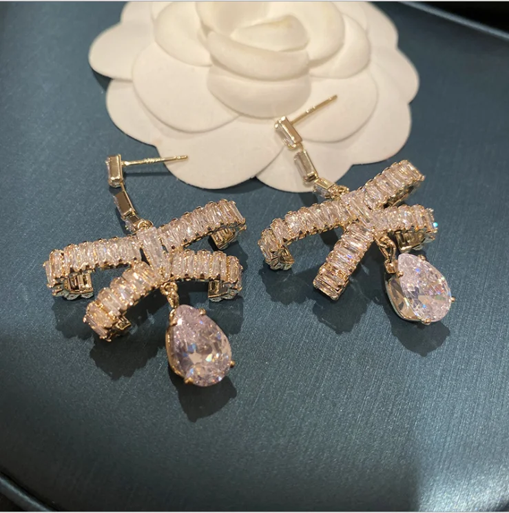 

Three-dimensional diamond large bow stud earrings drop pendant silver needle crystal flashing zircon exaggerated retro earrings